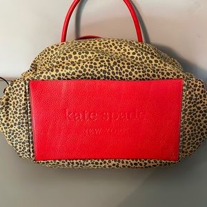 Kate Spade bag.  Can be an overnight bag. Leopard with red polka dot.